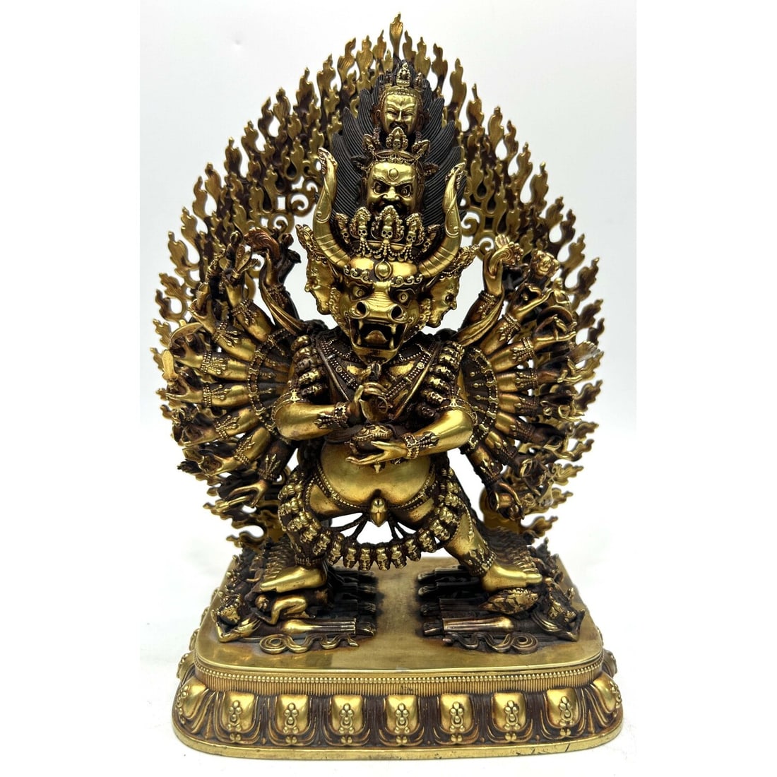 Chinese Gilt Bronze Buddhist Figure of Yamantaka: Chinese Gilt Bronze Buddhist Figure of Yamantaka. Marked At The Bottom & 6 Character Mark on The Back. Exceptional Detail & Quality. Condition: Generally Very Good. Dimensions: L-7" x H-10". Provenanc