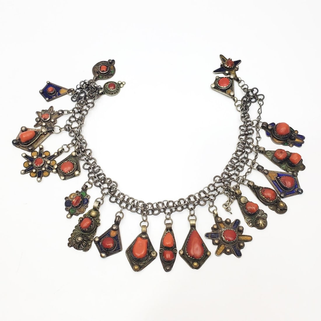 Antique Silver Chain Necklace w/ Charms: Antique Silver Chain Necklace w/ 21 NOT SILVER Charms. Each w/ Coral & Enamel Inlays. Please Note- Due to Recent Fraudulent Activity, All Jewelry Items Purchased by New Customers Cannot Be Shipped Out