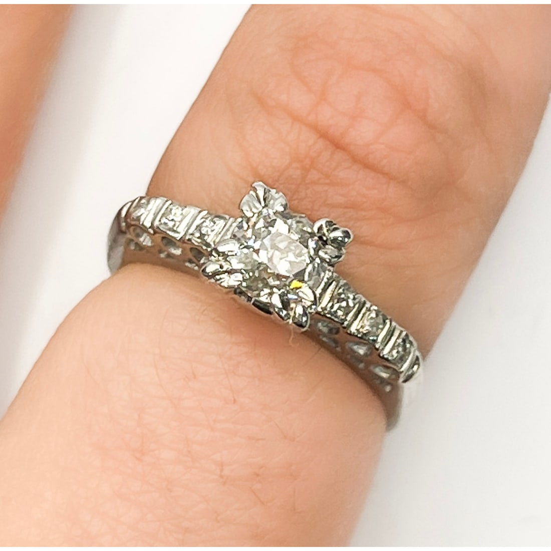 14K White Gold & Diamonds Engagement Ring: 14K White Gold & Diamonds Engagement Ring. The Center Diamond is Approximately 0.25 Carats. Please Note- Due to Recent Fraudulent Activity, All Jewelry Items Purchased by New Customers Cannot Be Shipp