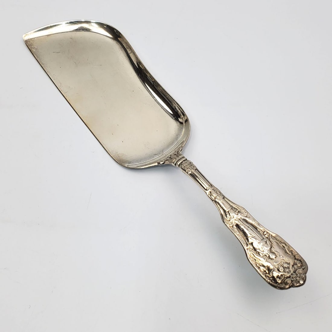 Antique Sterling Silver Crumb Catcher: Antique Sterling Silver Crumb Catcher. Fully Hallmarked. Condition: Generally Very Good. Monogrammed. Dimensions: L-12". Weight: 197.9g/6.3ozt. Provenance: From a Long Island, NY Home. Please note the