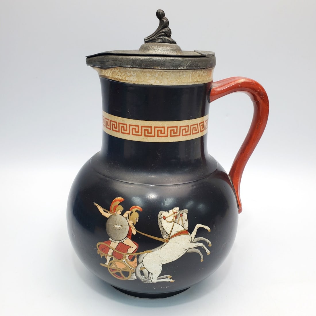 Antique English Neoclassical Porcelain Pitcher: Antique English Neoclassical Greek Revival Porcelain Pitcher. Condition: Generally Good. Dimensions: H-9.5" x L-7" Handle to Spout. Provenance: From a Long Island, NY Home. Please note the absence of