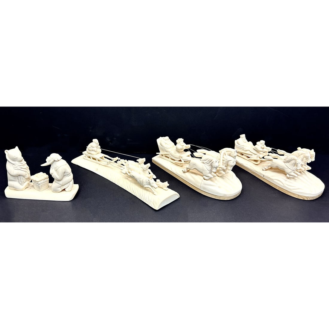 4 Old Russian Artistic Bone Carvings of Troika: 4 Old Russian Artistic Bone Carvings of Troika Carriages & Yupik Figures Made in Tobolsk Siberia, Russia. Condition: Generally Very Good. Dimensions: Longest-L-8.25". Provenance: From a Long Island, N