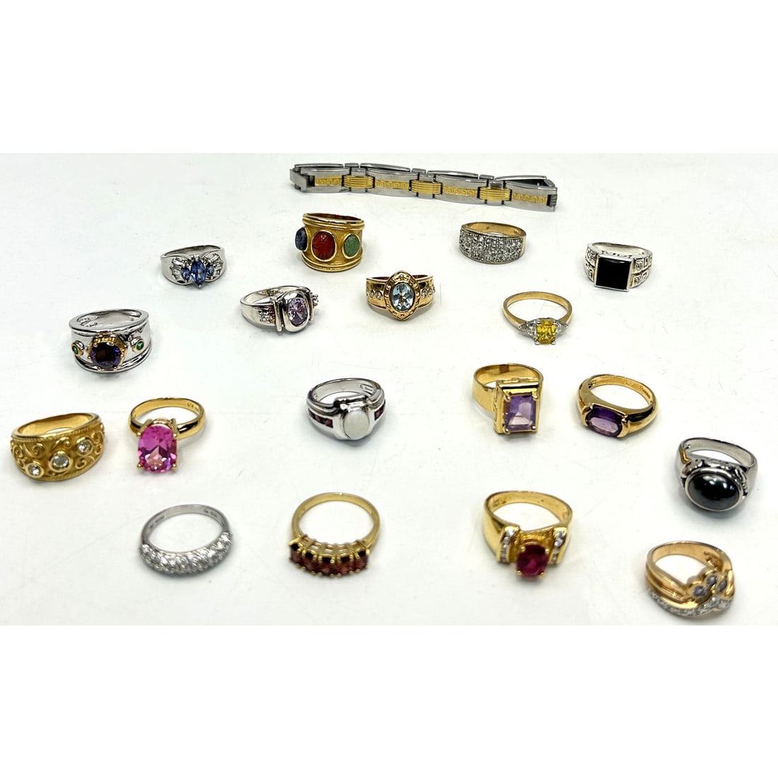 Lot of 18 Gilt Rings: Lot of 18 Gilt Rings. Some w/ Semi Precious Stones. Along w/ a Bracelet. Please Note- Due to Recent Fraudulent Activity, All Jewelry Items Purchased by New Customers Cannot Be Shipped Out Until 3 Week