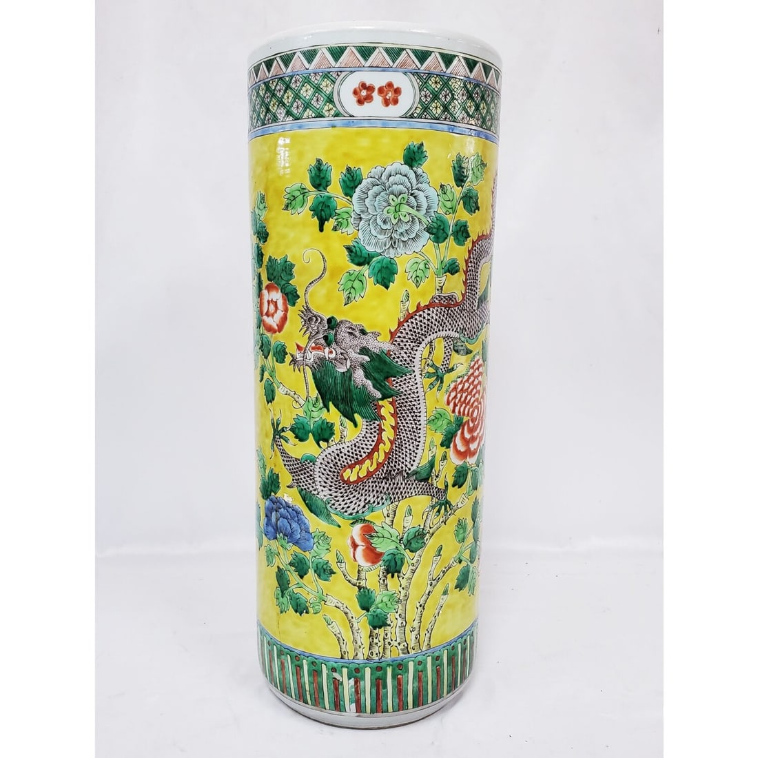 Large Chinese Porcelain Umbrella Stand w/ Dragons: Large Chinese Porcelain Dragon Decorated Umbrella Stand.Condition: Generally Very Good. There Is A Large Half Moon Old Hairline On One Side. Dimensions: H-23.5" x Dia-8.75". Provenance: From a Long Is