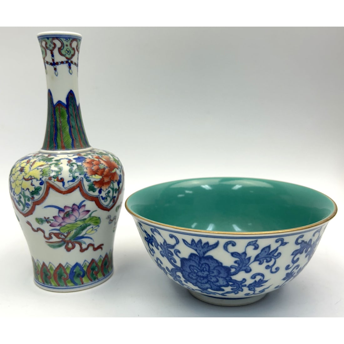 2 Chinese Signed Porcelain Items: 2 Chinese Signed Porcelain Items Including a Blue & White Bowl & Floral Design Vase. Condition: Both Generally Very Good. Dimensions: Vase-H-7.5". Bowl-Dia-5.8". Provenance: From a Long Island, NY Hom