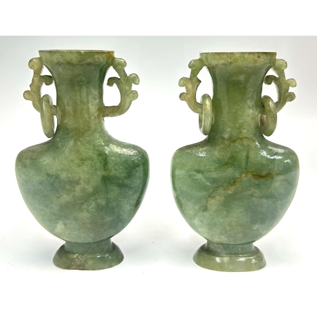 Pair Early Possibly Carved Jade Vases Small Vases: Pair of Early Possibly Carved Jade Vases Small Vases. Condition: Generally Good. 1 Has a Ring.Dimensions: H-3.4".Provenance: From a Long Island, NY Home. Please note the absence of a Condition Report