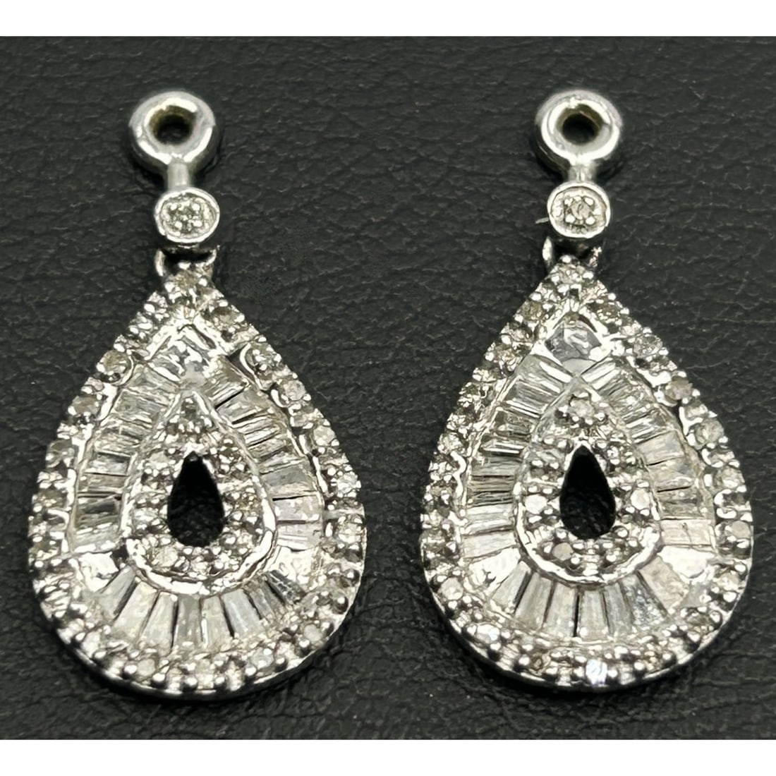 14K White Gold & Diamonds Drop Earring Settings: Pair of 14K White Gold & Diamonds Drop Earring Settings. These Can Be Used As Pendants Also. Please Note- Due to Recent Fraudulent Activity, All Jewelry Items Purchased by New Customers Cannot Be Ship
