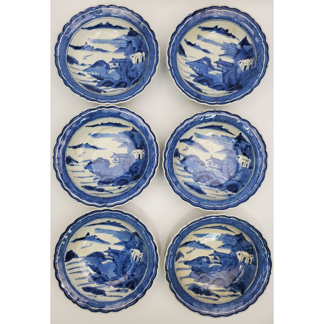 Set 6 Japanese Imari Blue & White Porcelain Bowls: Set of 6 Japanese Imari Blue & White Porcelain Bowls w/ Landscape Decorations & Scalloped Edges. Condition: Generally Good. Dimensions: Dia-6.75" x H-2". Provenance: From a Long Island, NY Home. Pleas