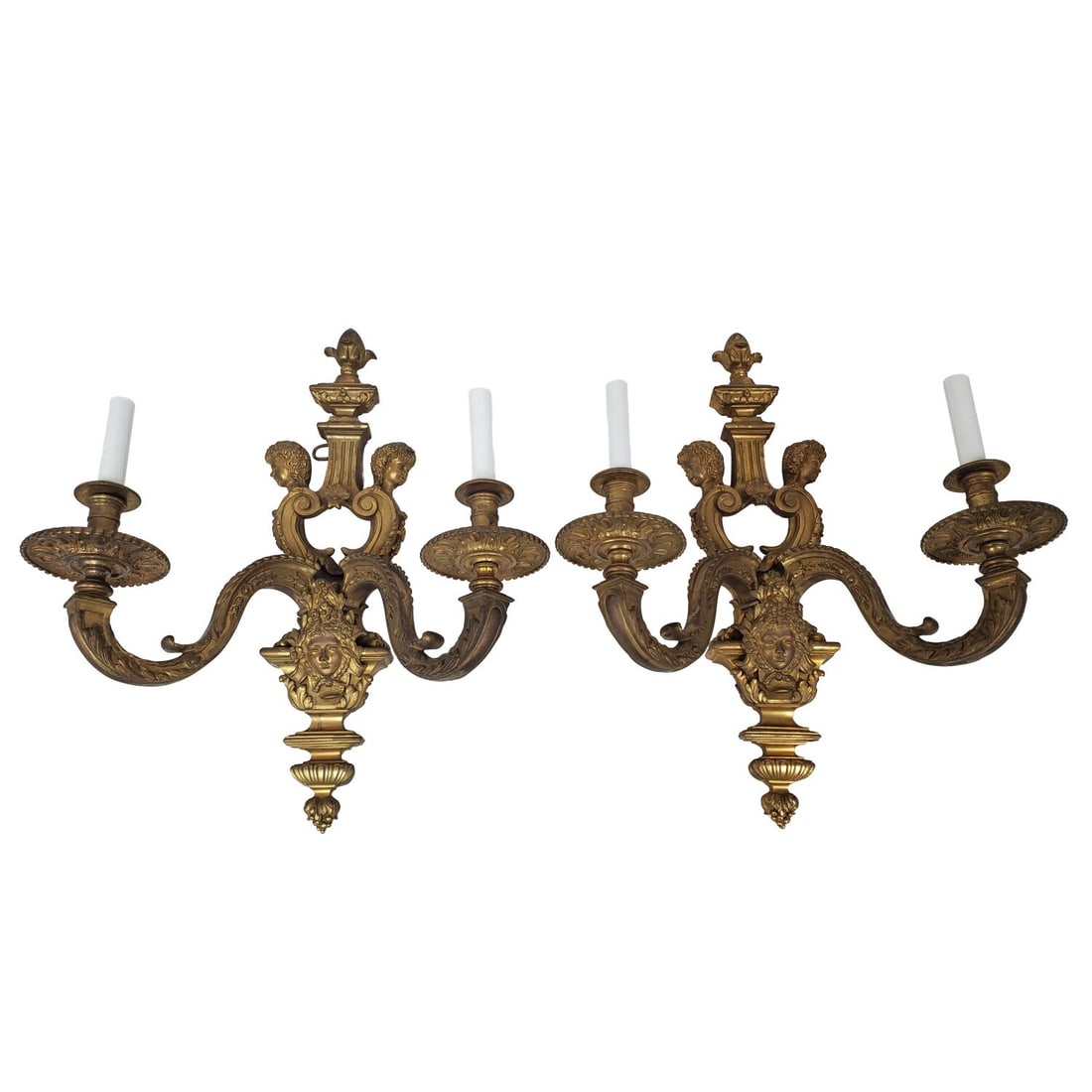 Pair Antique French Bronze Neoclassical Sconces: Pair of Antique French Gilt Bronze Neoclassical Style Large 2-Light Wall Sconces w/ Decorations of Cherubs. Condition: Generally Good. Please Note- We Do Not Guarantee the Workability or Wiring of Any