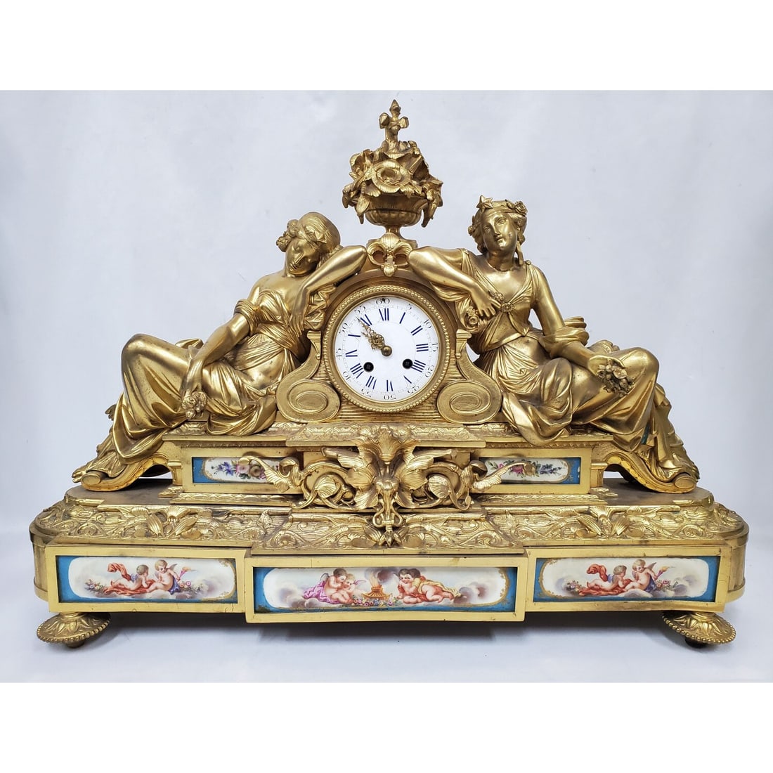 French 19th C. Dore Bronze, Sevres Porcelain Clock: Large Fine French Napoleon III 19th C. Antique Dore Bronze & Sevres Porcelain Mantel Clock. Attributed to Miroy Freres or Japy Freres. The Bronze Depicts 2 Classical Women. Please Note, This Clock is 