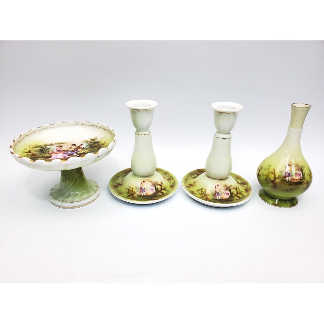 4 Russian "Gardner" Porcelain Items: 4 Russian "Gardner" Porcelain Items Including 2 Candlesticks, Small Footed Platter & 1 Vase. All Are Fully Marked. Condition: Generally Good. 1 Candlestick Has A Chip on The Top. The Top Of The Vase H