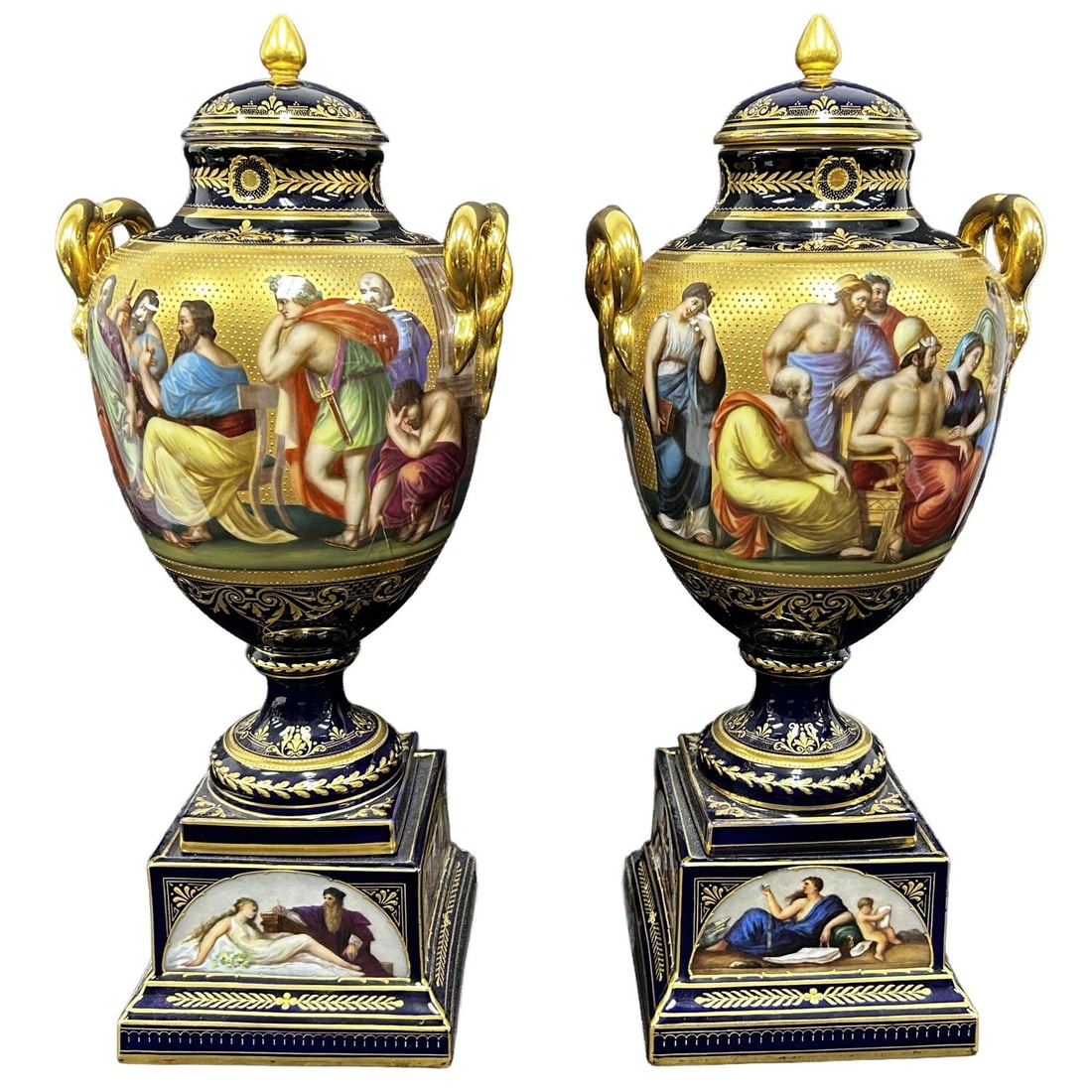Pair of Royal Vienna Antique 19th C Porcelain Urns: Pair of Royal Vienna Antique 19th C. Covered Porcelain Urns w/ Cobalt Blue Background, Extensive Gilt Decorations, Hand Painted Figures All Around, & Snake Handles. Fully Marked. Originally Purchased 