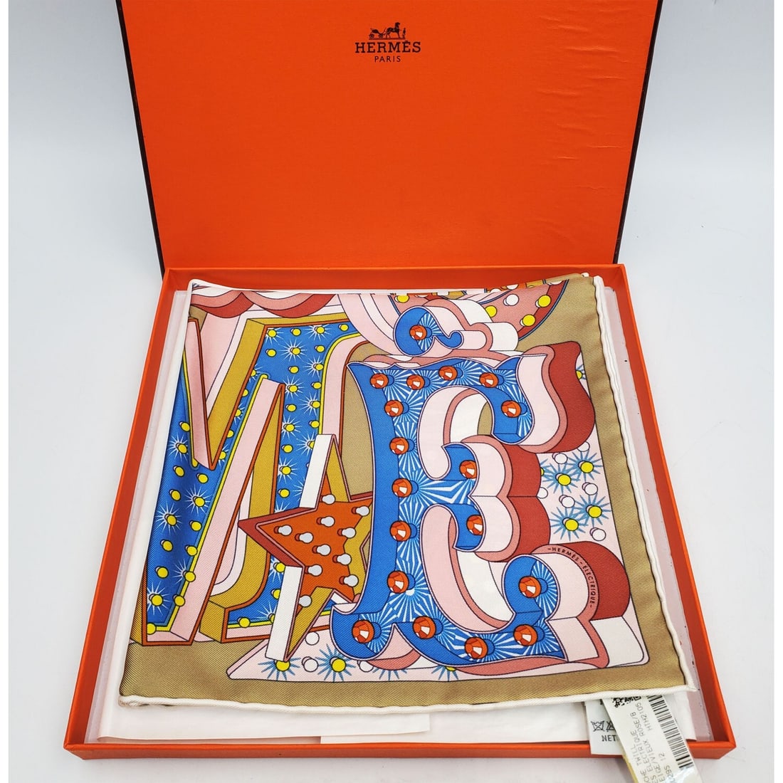 Hermes Gavroche Silk Scarf "Electrique": Hermes Gavroche Silk Scarf "Electrique". Fully Marked. With Original Tag & Original Box. Condition: Excellent. Unused.Dimensions: Scarf-16.5" x 16.5". Box-9.5" x 9.5". Provenance: From a Long Island, 