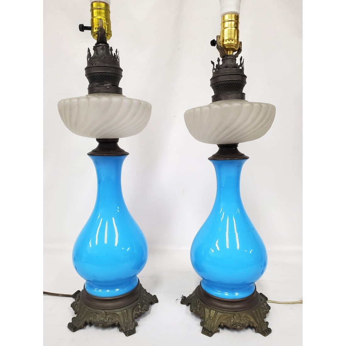 Pair of Early Opaline Glass Vases Mounted As Lamps: Pair of Early Opaline Glass Vases Mounted As Lamps. Condition: Generally Good. Please Note- We Do Not Guarantee the Workability or Wiring of Any Lamps or Chandeliers.Dimensions: Total H-20" Each. Prov