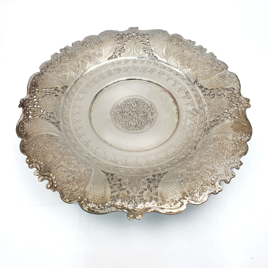 Persian 84 Silver Reticulated Signed Candy Dish: Persian 84 Silver Reticulated Signed Candy Dish. Fully Hallmarked. Condition: Generally Good w/ Tarnish. Dimensions: Dia-10.25" x H-1.75". Gross Weight: 55.9g/18ozt. Provenance: From a Long Island, NY