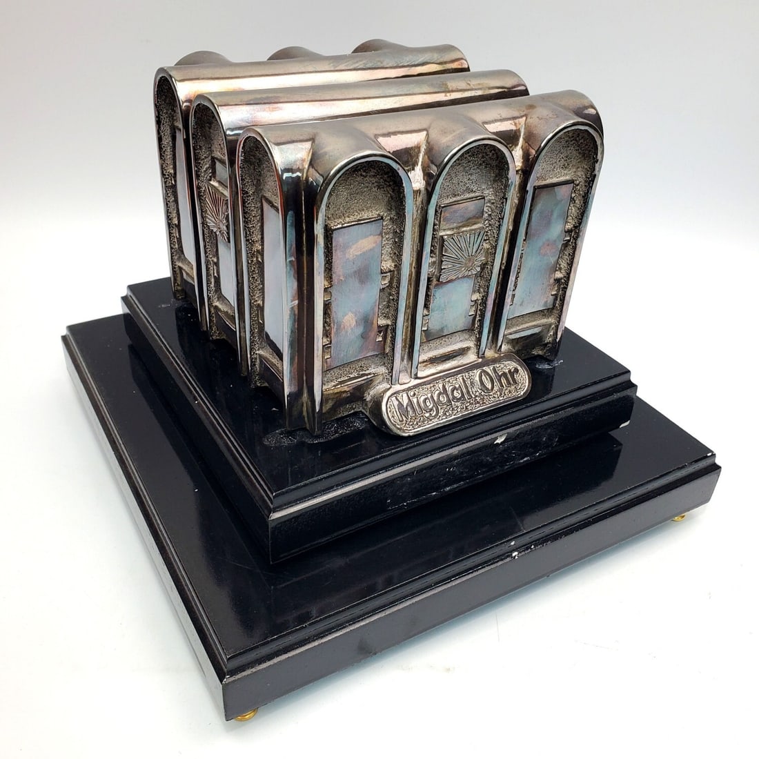 Judaica Vintage Sterling Silver Clad Sculpture: Judaica Unusual Vintage Sterling Silver Clad Sculpture "Migdal Ohr" On an Original Rotating Wood Base. Condition: Generally Very Good. Dimensions: Sculpture Alone-H-4.3" x W-5.3" x D-5.5". Total H. In
