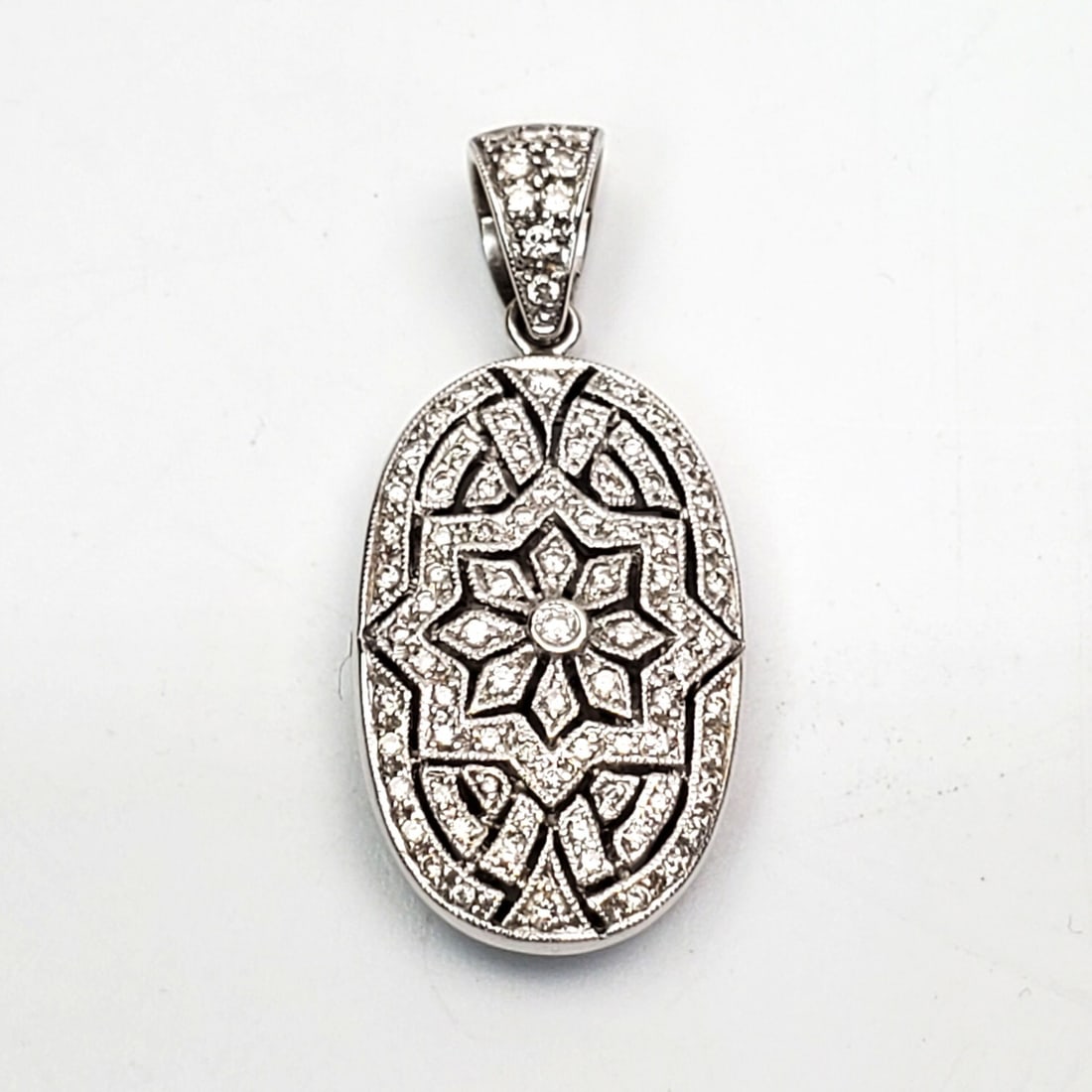 Fine 18K White Gold & Diamonds Large Pendant: Fine 18K White Gold & Diamonds Large Pendant. Please Note- Due to Recent Fraudulent Activity, All Jewelry Items Purchased by New Customers Cannot Be Shipped Out Until 3 Weeks After The Auction Date. C