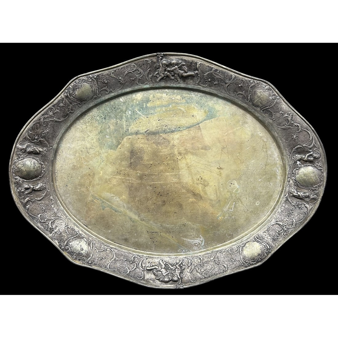 Antique 800 Silver Victorian Style Oval Platter: Antique 800 Silver Victorian Style Oval Serving Platter w/ Relief Decorations of Cherubs & Filigree. Fully Marked. Condition: Generally Good w/ Heavy Tarnishing & Scratches Due to Age & Use. Dimension