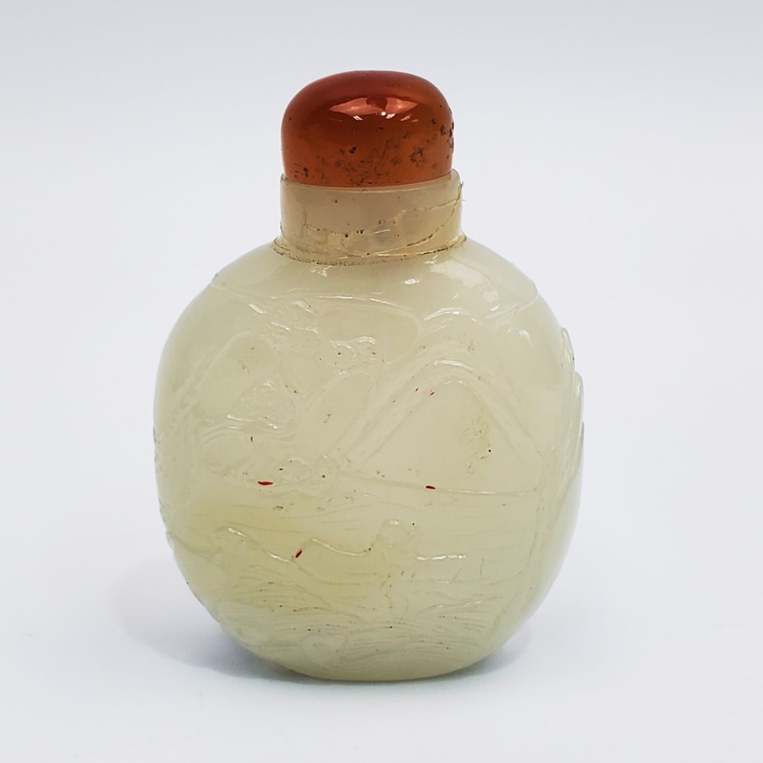Chinese Antique Carved White Jade Snuff Bottle: Chinese Antique Carved White Jade Snuff Bottle w/ Original Agate Stopper. Condition: Generally Very Good. Dimensions: H-2.3". Provenance: From a Private Collection of a Diplomat. Please note the absen