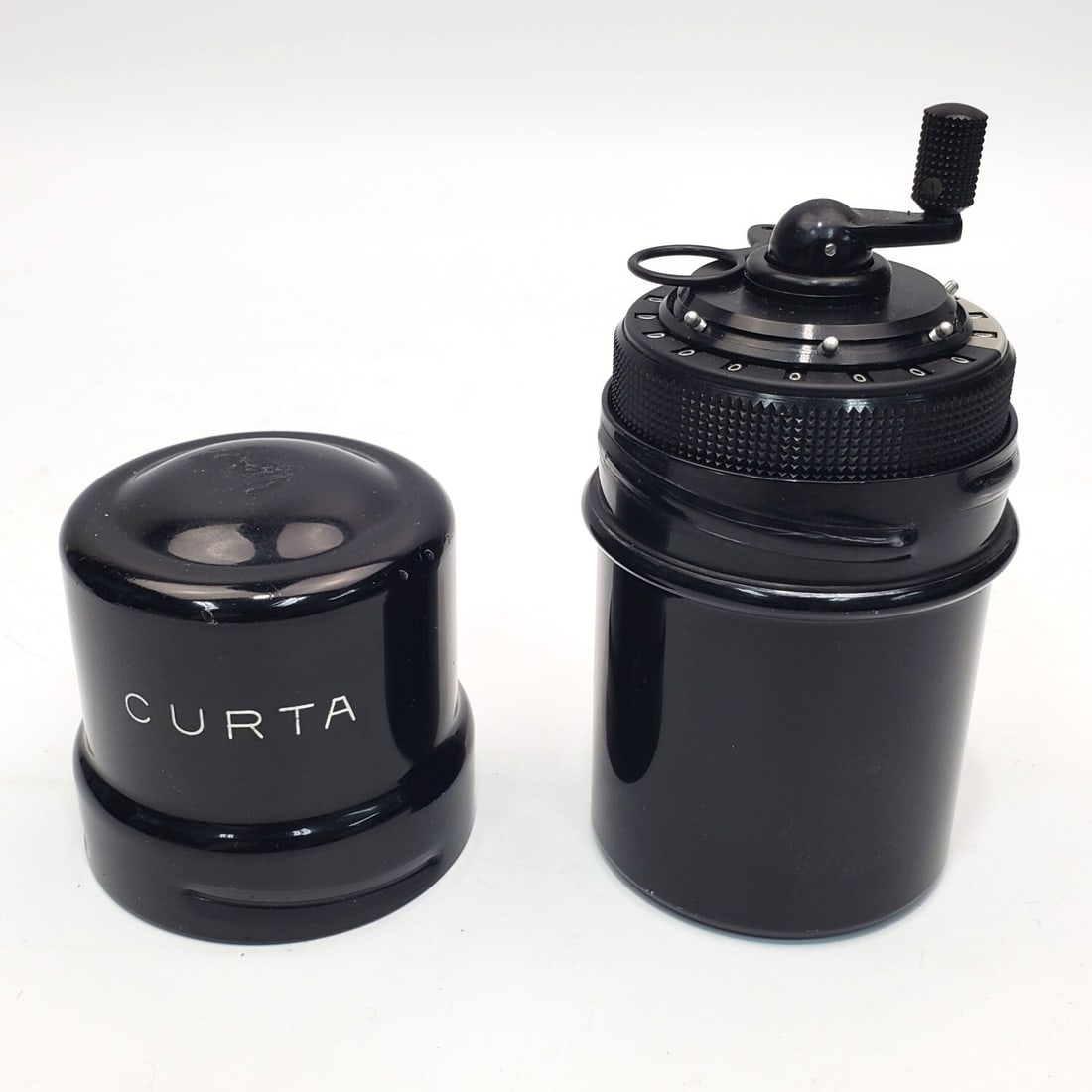 Vintage Curta Type 1 Mechanical Calculator: Vintage Curta Type 1 Mechanical Calculator by Contina Limited Mauren. Made in Liechtenstein. Designed by Curt Herzstark. Manufactured Between 1948-1972. Fully Marked. Serial Number 8969. In Original C