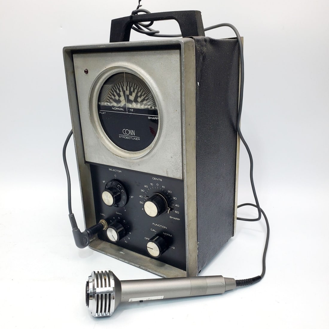 Vintage Conn ST-11 Strobotuner c.1971: Vintage Conn ST-11 Strobotuner c.1971. Serial Number 67162. Condition: As Found. Dimensions: H-12" x L-6.75" x W-5.5" (Excluding Microphone). Provenance: From a Long Island, NY Home. Please note the a