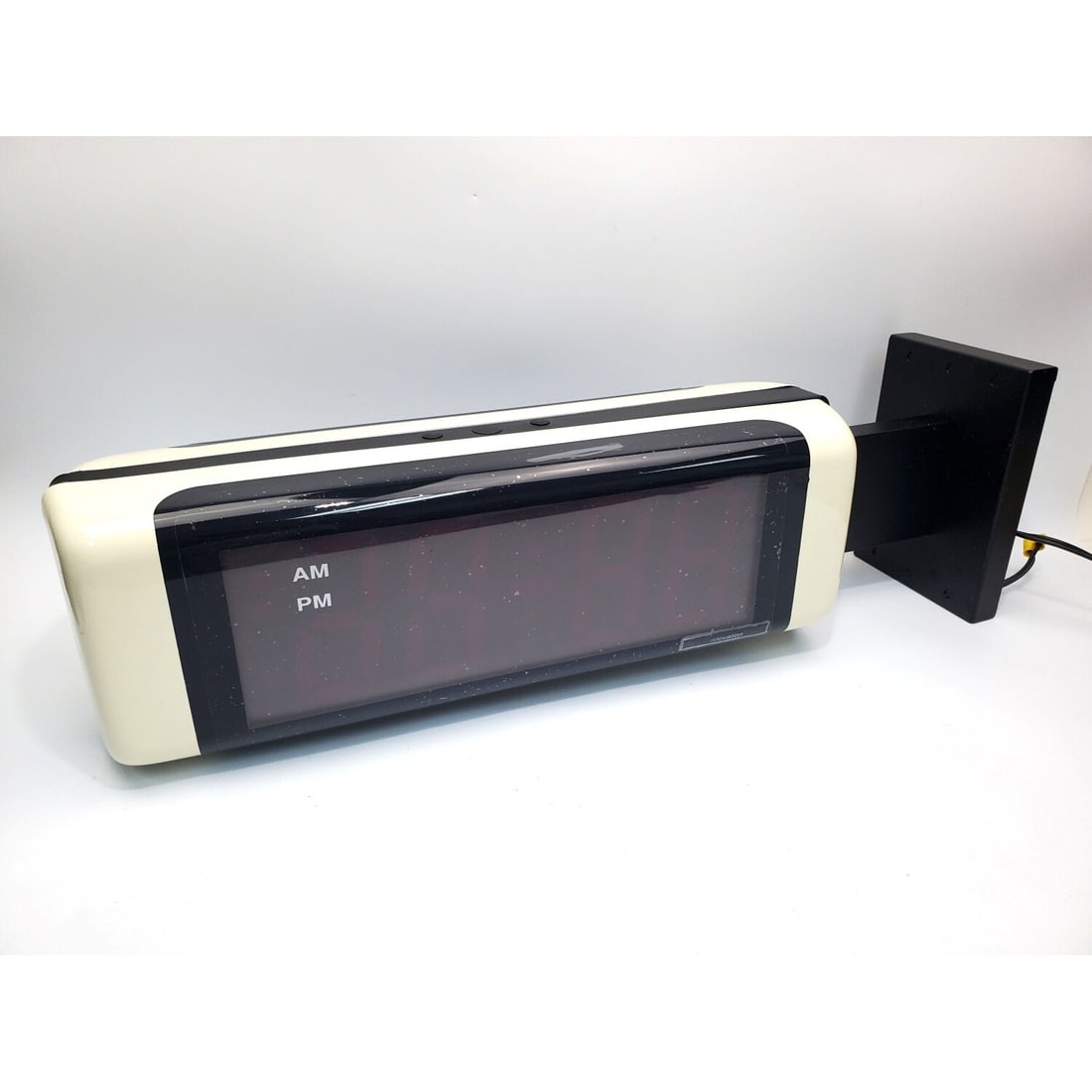 Innovation Wireless 4-Digit Red LED Digital Clock: Innovation Wireless 4-Digit Red LED Wall Mounted Digital Clock. Condition: As Found. Dimensions: H-26" x L-8" x W-5.5". Provenance: From a Long Island, NY Home. Please note the absence of a Condition 