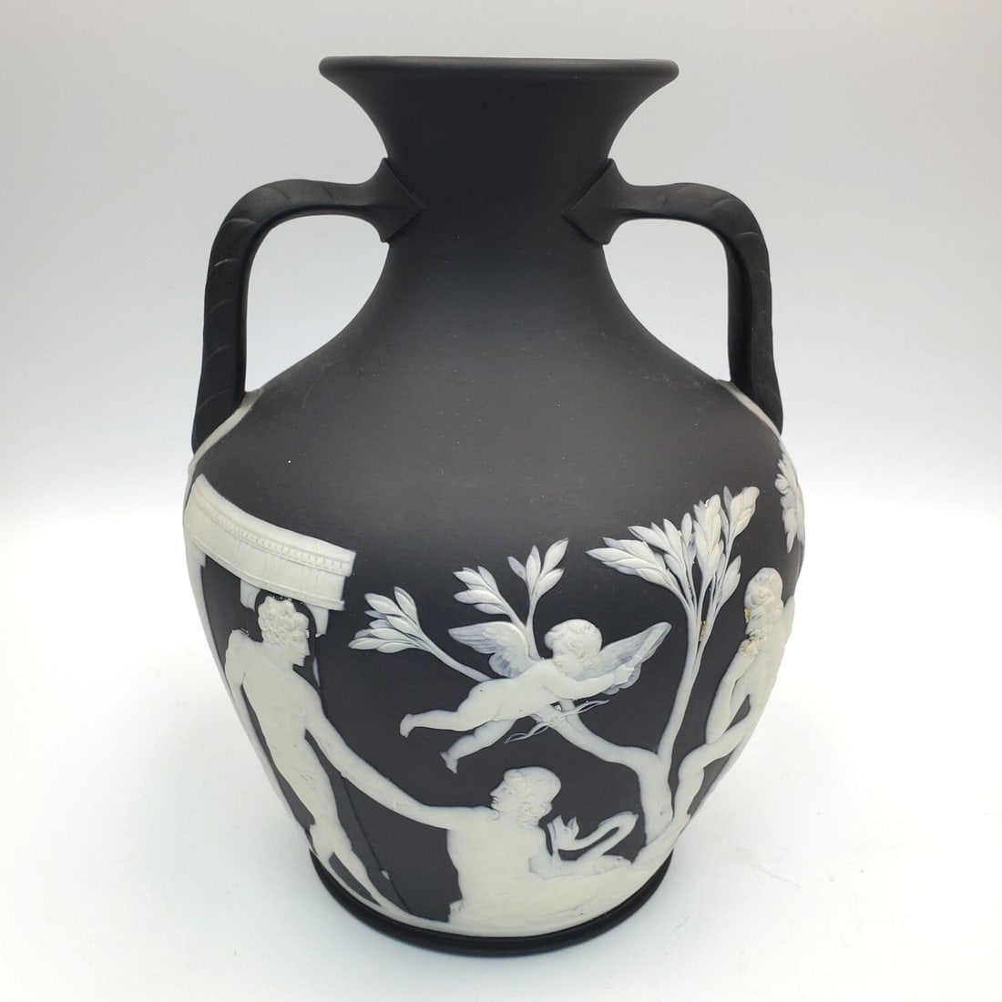 Wedgwood Black & White Portland Vase: Wedgwood Black & White Double Handled Portland Vase c.1870. Fully Marked. Condition: Generally Good. Dimensions: H-10" x Dia-7". Provenance: From a Long Island, NY Home. Please note the absence of a C