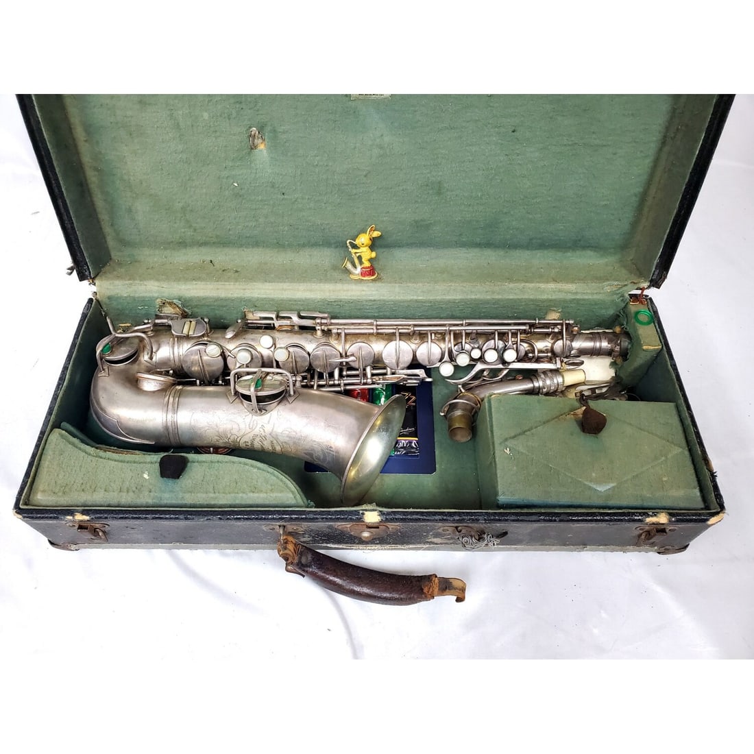 Conn Alto Saxophone c.1930's: Conn Alto Saxophone c.1930's w/ Original Mouth Piece. In an Original Fitted Box. Fully Marked. Condition: As Found. Dimensions: Box-L-24" x W-10" x H-6". Provenance: From a Long Island, NY Home. Pleas