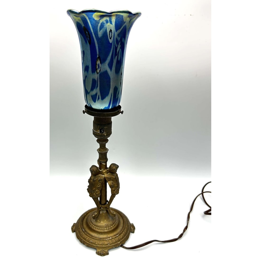 Vintage Tiffany Style Iridescent Glass Lamp Shade: Vintage Tiffany Style Iridescent Glass Lamp Shade w/ Metal Base. Condition: Generally Good. Please Note- We Do Not Guarantee the Workability or Wiring of Any Lamps or Chandeliers. Dimensions: Total H-