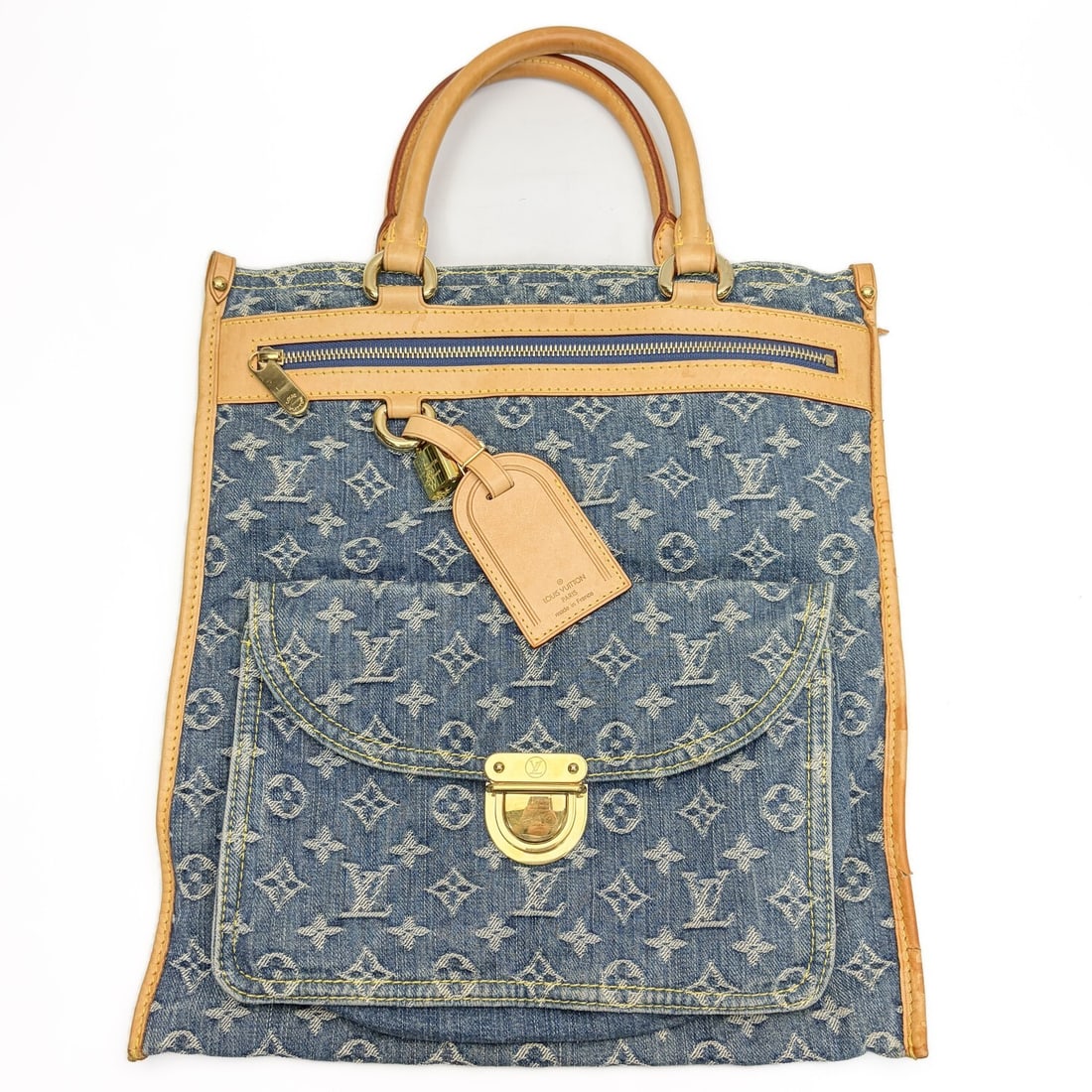 Vintage Louis Vuitton Monogram Denim Flat Shopper: Vintage Louis Vuitton Monogram Denim Flat Shopper Tote Bag. We Are Unable To Confirm 100% Authenticity. Condition: Used. Dimensions: H-14" x L-12.75"Provenance: From a Long Island, NY Home.Please note
