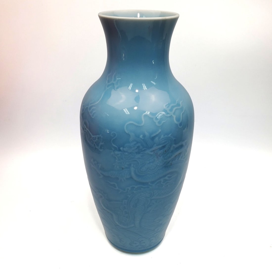 Chinese Signed Blue Glazed Porcelain Vase: Chinese Signed Blue Glazed Porcelain Vase w/ Dragon Decorations. Condition: Generally Very Good. Dimensions: H-13.25" x Dia-5.5". Provenance: From a Long Island, NY Home. Please note the absence of a 