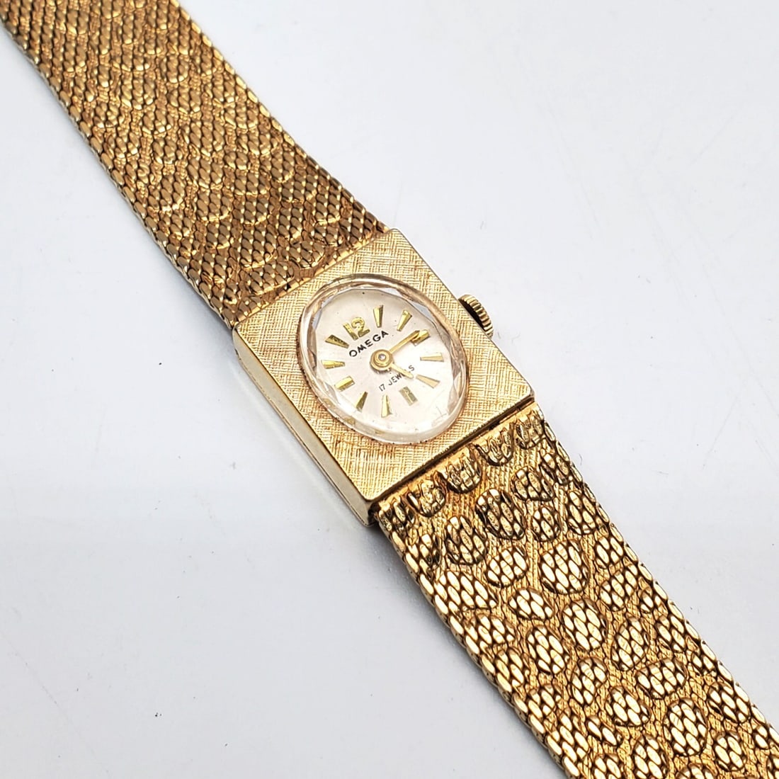 Vintage Omega Watch: Vintage Omega Watch. Marked As Gold But Does Not Test As Gold. Condition: Generally Good. Please Note, We Do Not Guarantee The Workability of Old Watches. Dimensions: L-8.25". Face-0.75" x 0.8". Prove