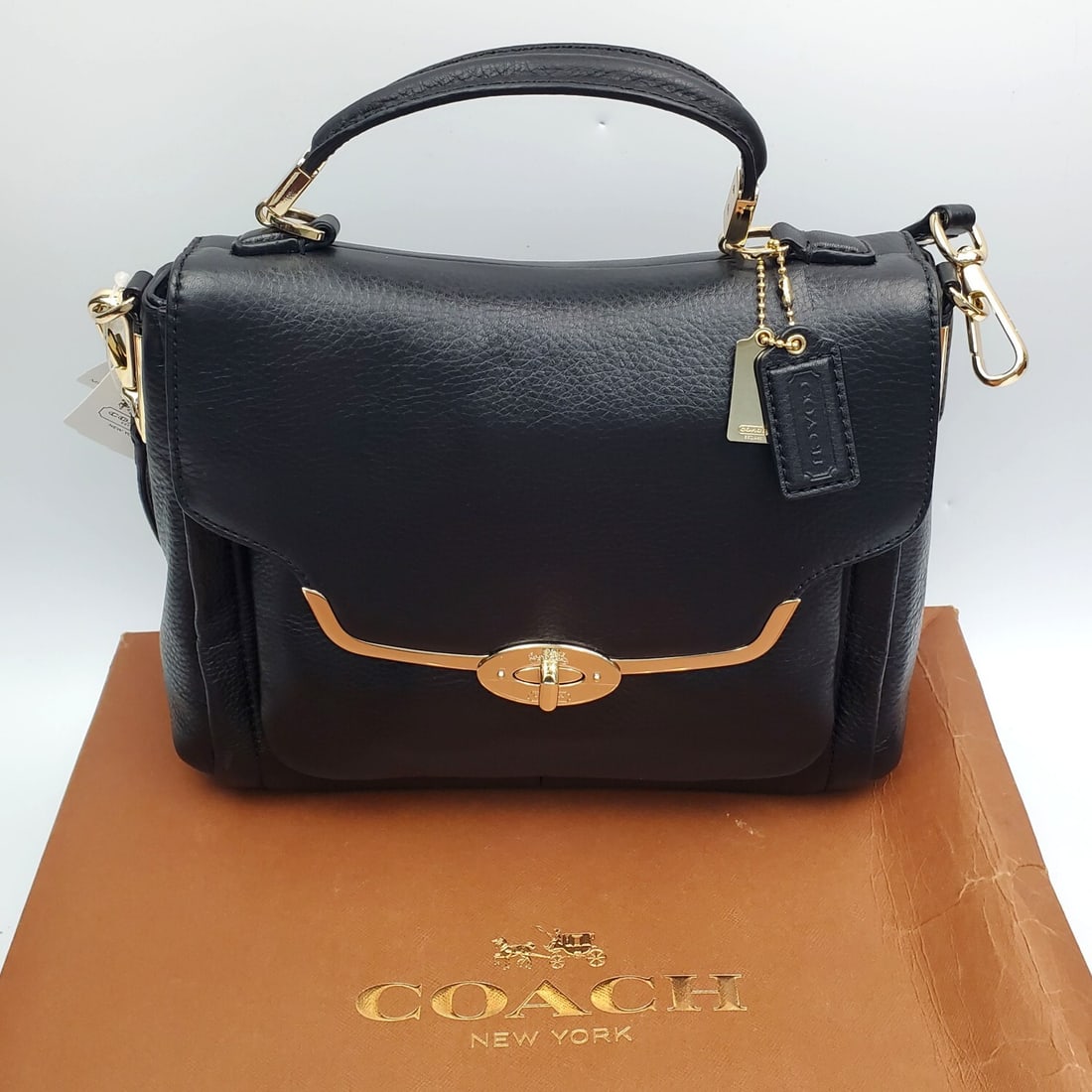 Brand New Coach Leather Purse In Original Box: Brand New Coach Leather Purse In Original Box w/ Dust Bag. Original Price Was $298. Condition: Excellent. Dimensions: Bag-11" x 8" (Not Including Straps). Box-14.5" x 14.5" x 5.5". Provenance: From a 