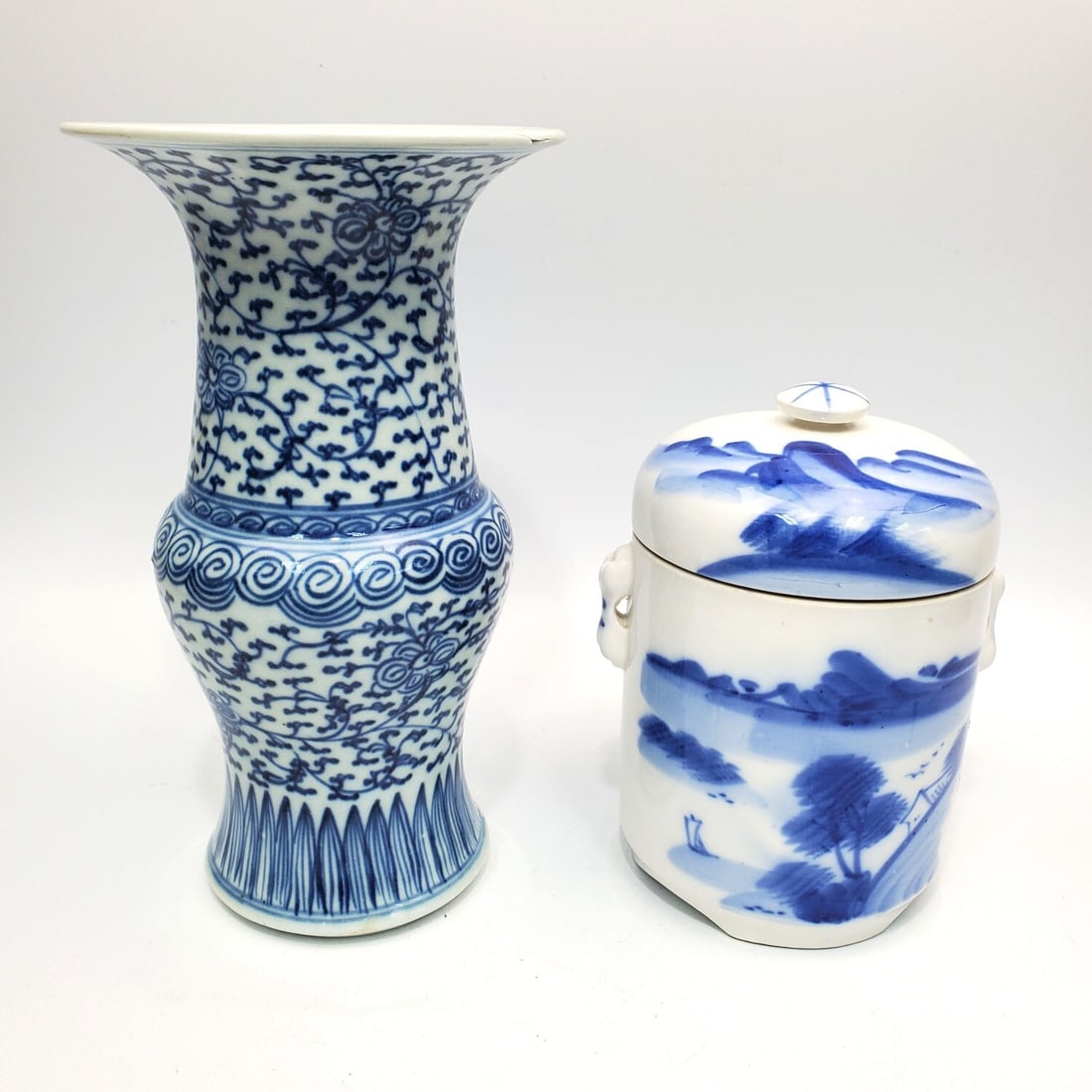 2 Chinese Blue & White Porcelain Items: 2 Chinese Blue & White Porcelain Items Including a Vase & a Covered Jar. Condition: Vase Has Chips. Dimensions: Larger-H-9.1". Provenance: From a Long Island, NY Home. Please note the absence of a Con