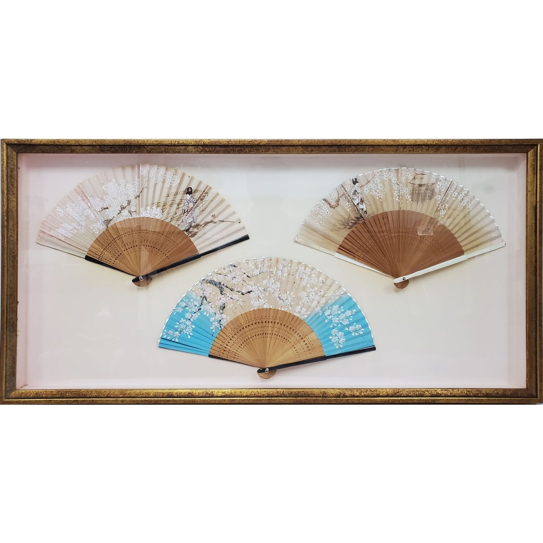 3 Vintage Japanese Fans in a Beautiful Frame: 3 Vintage Japanese Fans in a Beautiful Frame Under Glass. Has Not Been Examined Out of Frame. Condition: Generally Very Good. Dimensions: Each Fan-L-14" x H-8". Frame-35.5" x 17.5". Provenance: From a