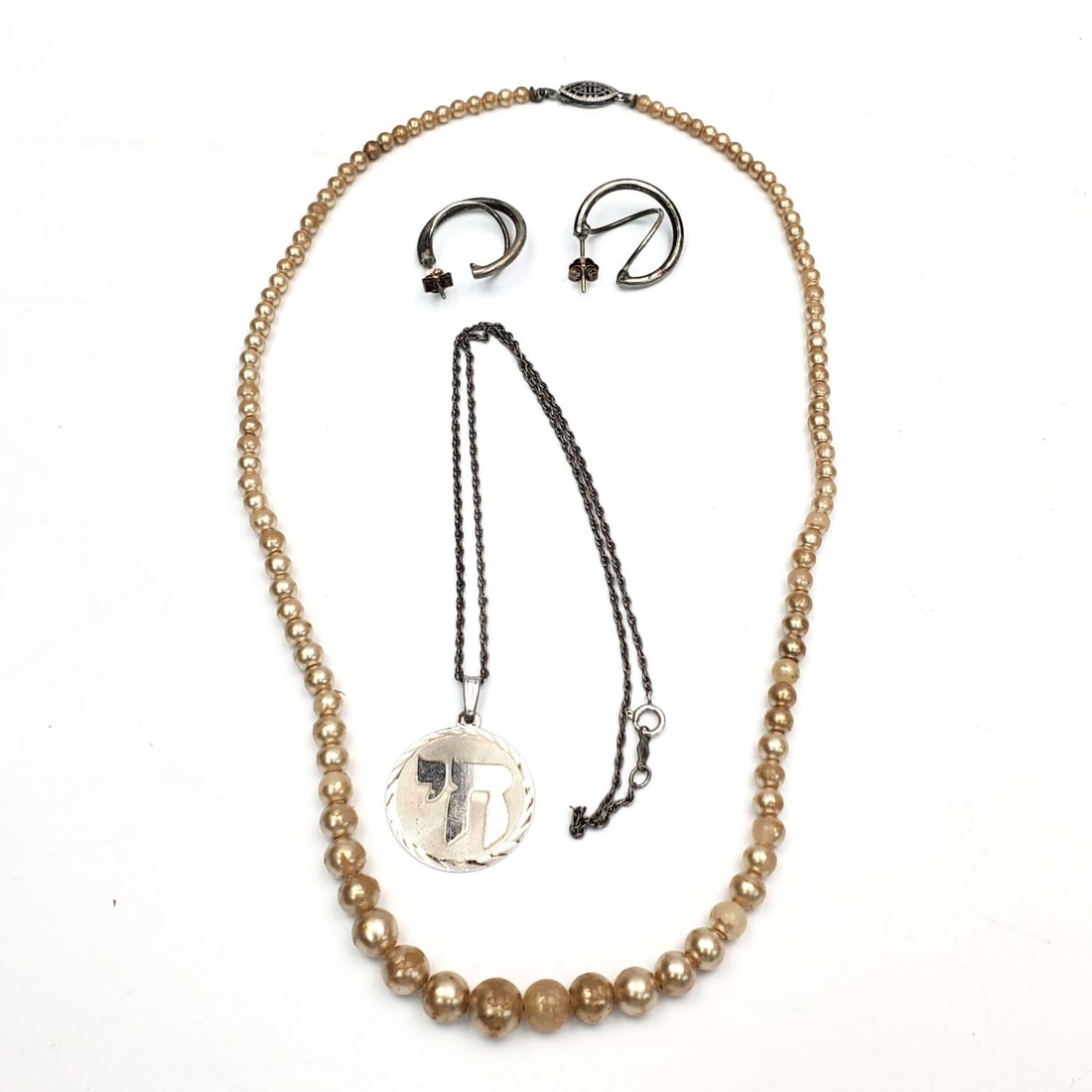 Lot of 3 Sterling Silver Jewelry Items: Lot of 3 Sterling Silver Jewelry Items Including a Chai Pendant on a Long Chain Necklace, a Pair of Earrings & a Pearl Necklace w/ a Sterling Silver Clasp.Condition: Generally Good. Dimensions: Chain-