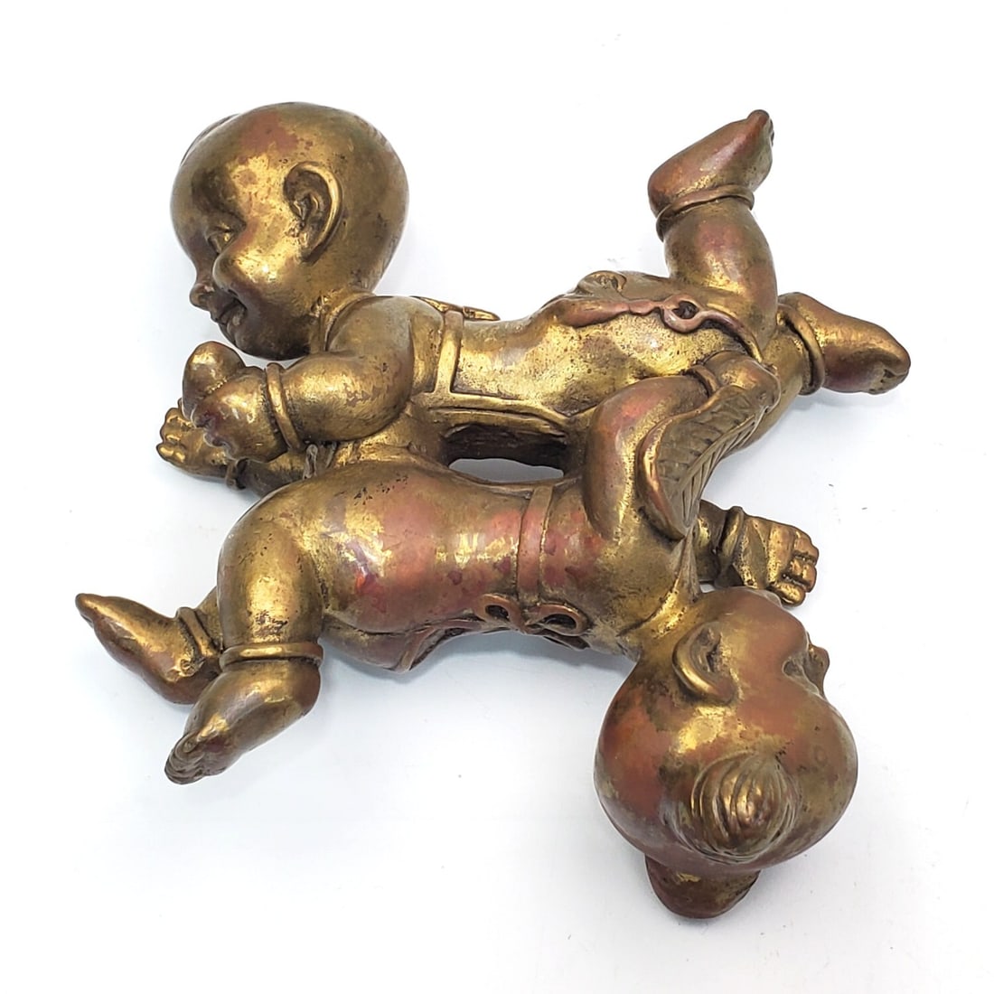 Chinese Antique Bronze Scroll Weight: Chinese Antique Bronze Scroll Weight Depicting "Sixi Tongzi" Twins.Condition: Generally Good w/ Some Losses to The Gilt Decorated Bronze.Dimensions: L-4.3" x H-4.3". Gross Weight: 872g. Provenance: Fr