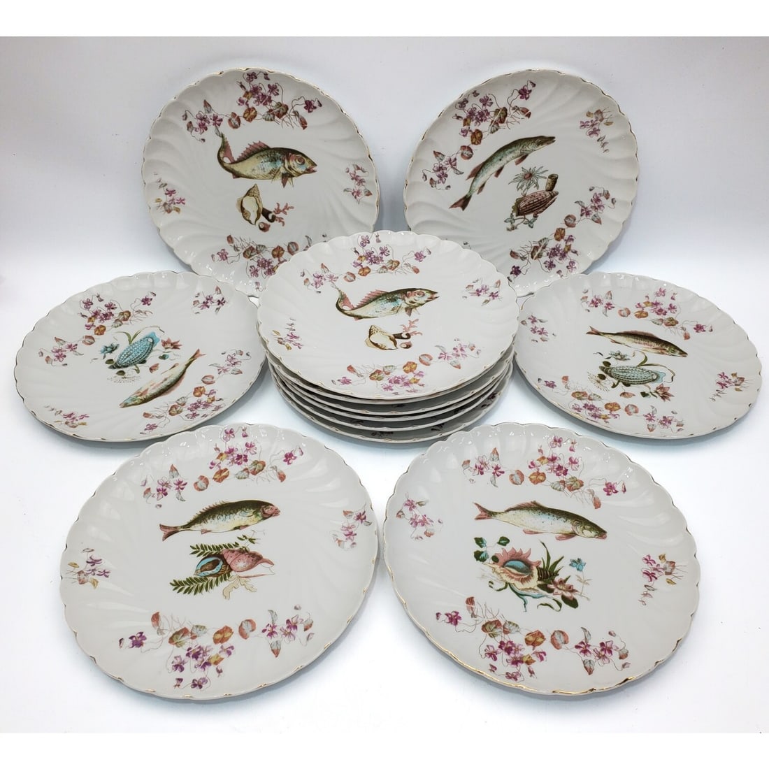 Set 8 Antique Austrian Porcelain Plates w/ Fish: Set 8 Antique Austrian Porcelain Plates w/ Fish Decorations. Fully Marked At The Bottom. Condition: Generally Very Good. Dimensions: Dia-8.5". Provenance: From a Long Island, NY Home.Please note the a