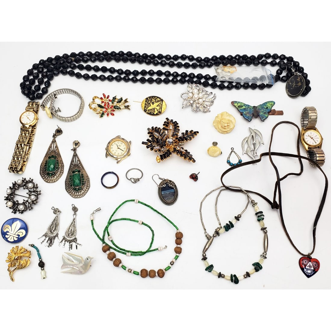 Bag Lot of Costume Jewelry & Vintage Watches: Bag Lot of Costume Jewelry & Vintage Watches. Condition: Generally Good. As Found. Dimensions: Various Sizes. Provenance: From a Long Island, NY Home. Please note the absence of a Condition Report doe