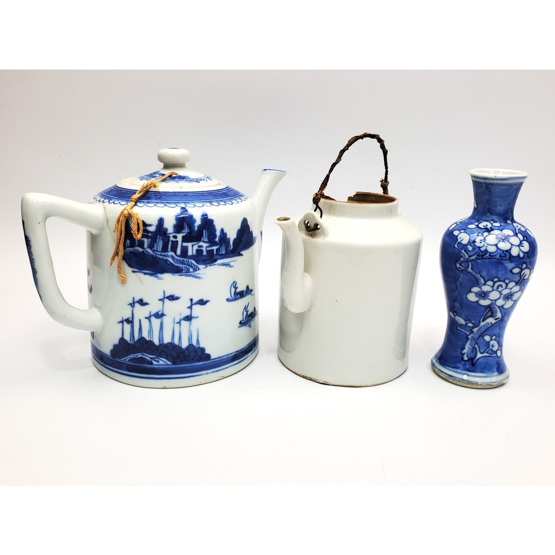 Lot of 3 Chinese Porcelain Items: Lot of 3 Chinese Porcelain Items Including a Blue & White Tea Pot & Vase. Condition: As Found. Dimensions: Largest-H-6.5" x L-8". Provenance: From a Long Island, NY Home. Please note the absence of a 
