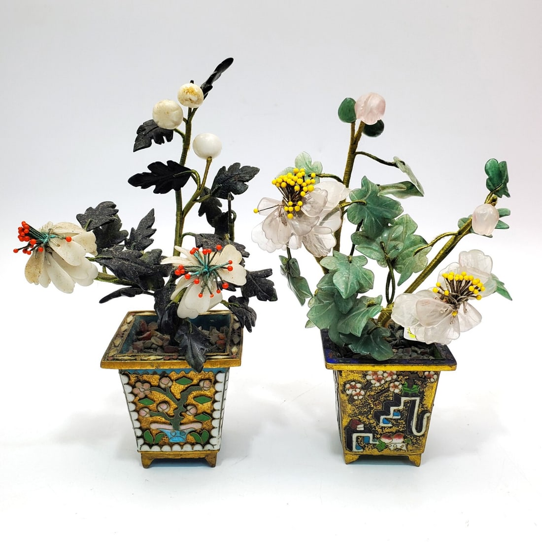 2 Chinese Jade Plants w/ Champleve Planters: 2 Chinese Jade Plants w/ Champleve Planters. Condition: Generally Very Good. Dimensions: Taller-H-6.25". Provenance: From a Long Island, NY Home. Please note the absence of a Condition Report does