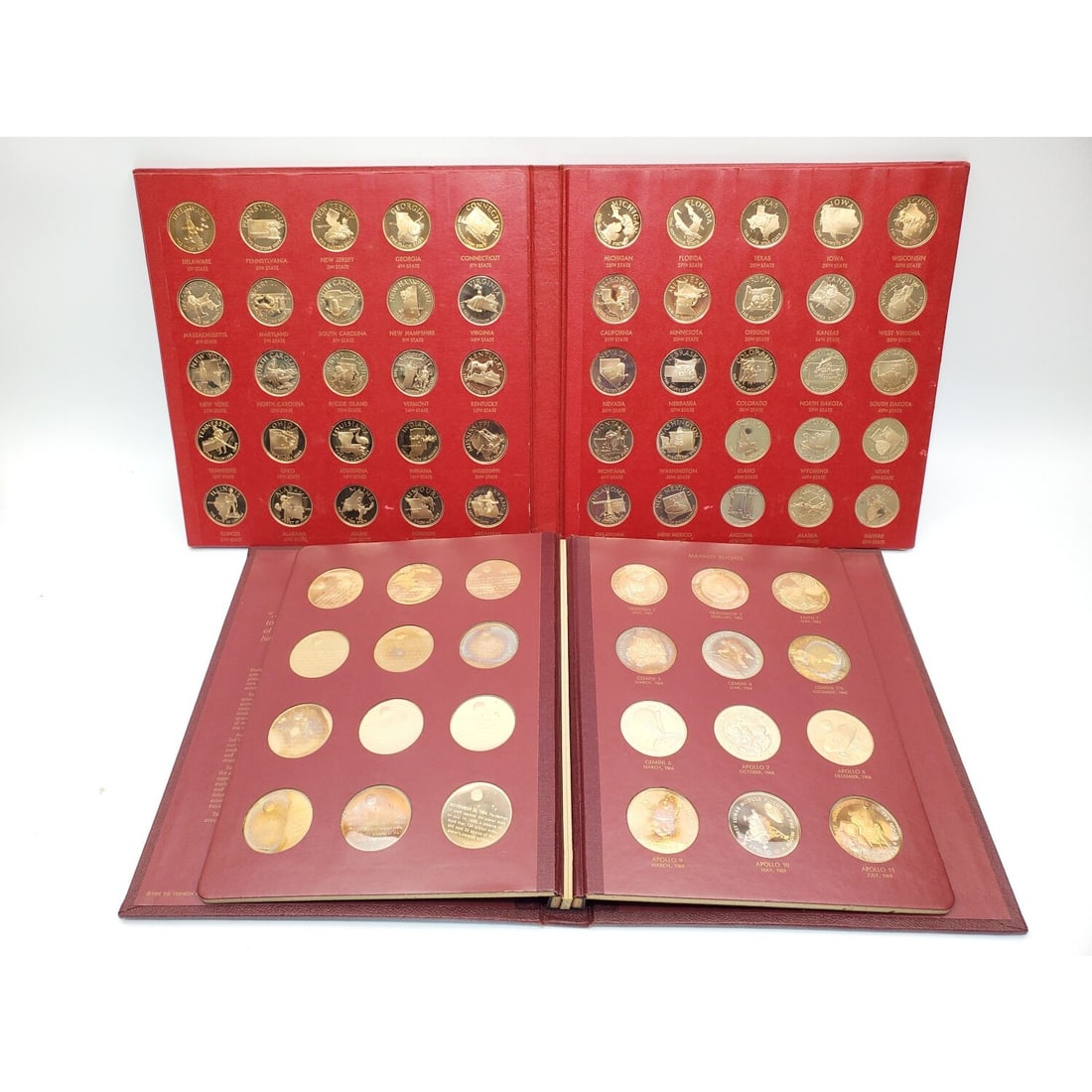 2 Franklin Mint Solid Bronze Proof Sets: 2 Franklin Mint Solid Bronze Proof Sets Including "States of The Union" Dated 1969 & "American in Space" Dated 1970. Condition: Generally Very Good. Dimensions: Larger-10.5" x 10". Provenance: From a 