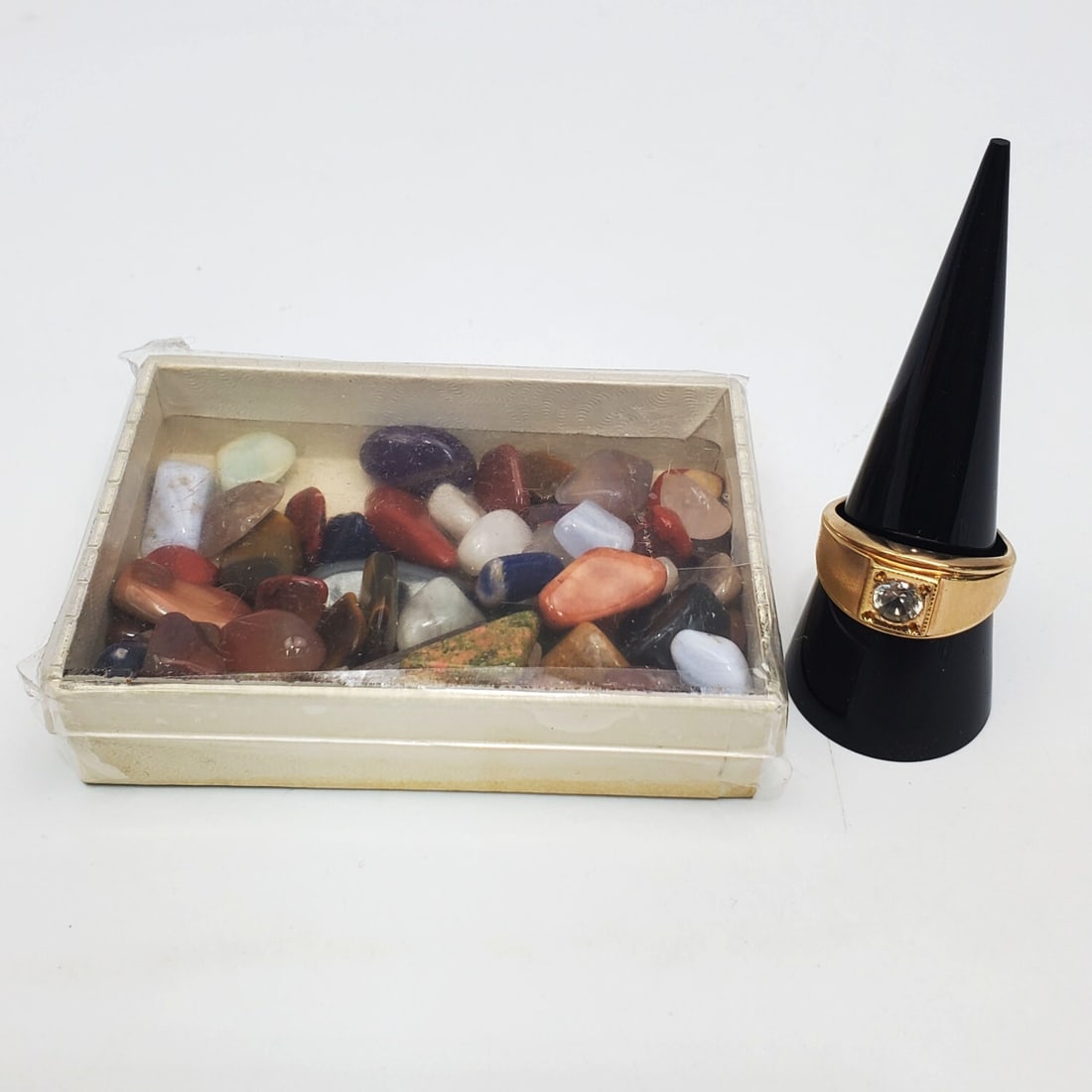 Group of Various Semi Precious Stones & Ring: Group of Various Semi Precious Stones Along w/ a 18K Gold Plated Avon Ring. Condition: Generally Very Good. Dimensions: Various Sizes. Ring Size: 10. Provenance: From a Long Island, NY Home. Please no