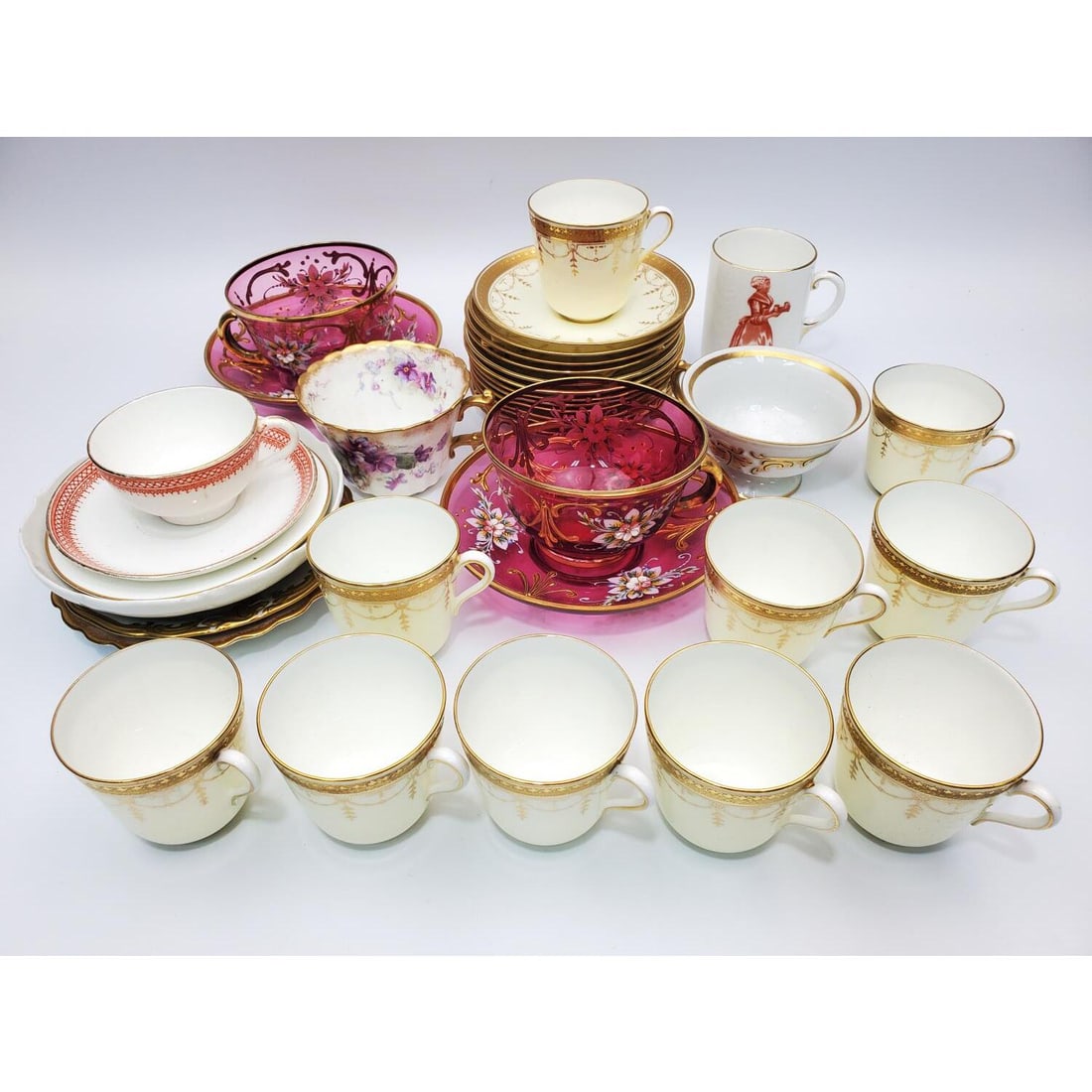 Lot of Antique Porcelain & Glass Cups & Saucers: Large Group Lot of Antique & Old Porcelain & Glass Cups & Saucers. Condition: Generally Very Good. Some Have Chips. Dimensions: Largest Saucer Dia: 5.5". Largest Cup Dia-3.75"Provenance: From a Long I