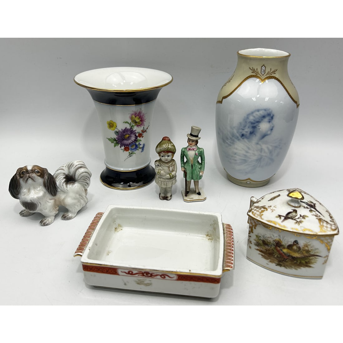 Antique Lot of 7 Continental Porcelain Items: Antique Lot of 7 Continental Porcelain Items Including Meissen, Early Royal Copenhagen, Dresden, & Others.Condition: Generally Good. As Found. Dimensions: Tallest H-6.5". Provenance: From a Long Islan