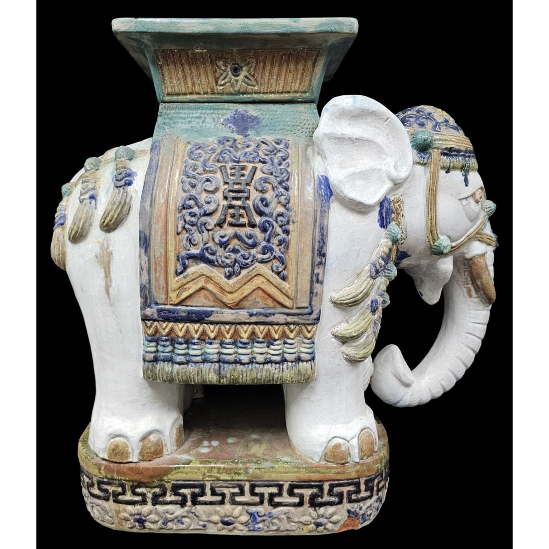 Chinese Vintage Large Enameled & Glazed Stool: Chinese Vintage Large Enameled & Glazed Ceramic Garden Stool in the Shape of an Elephant. Condition: Generally Good w/ a Chip on the Edge of the Base. Dimensions: L-22.5" x W-10.5" x H-23.5". Provenan