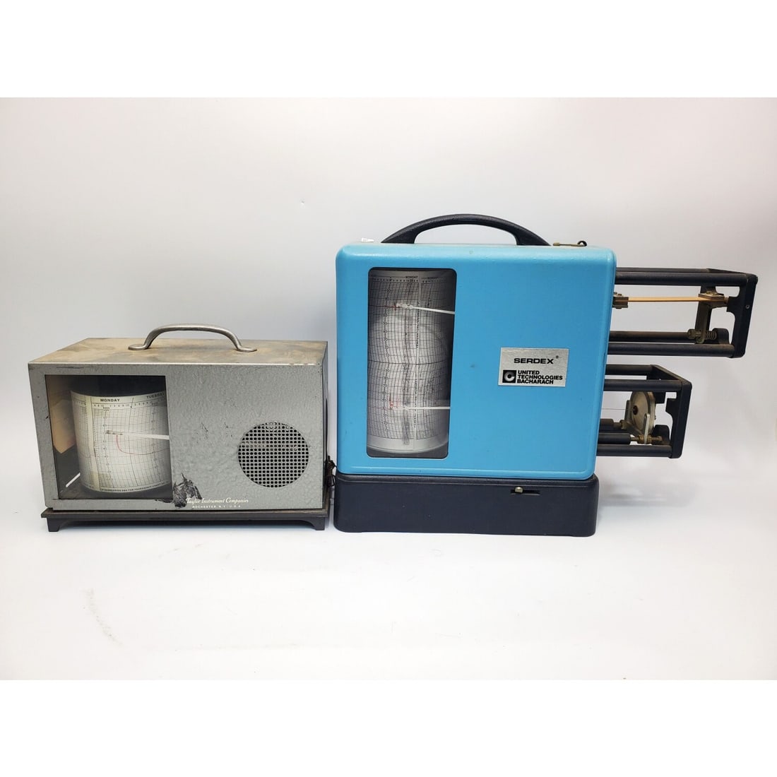 Lot of 2 Vintage Thermographs: Lot of 2 Vintage Thermographs Including 1 Taylor Instrument Co. & 1 Serdex. Condition: As Found. Dimensions: Larger-L-15" x H-12" x W-5.5". Provenance: From a Long Island, NY Home. Please note the abs