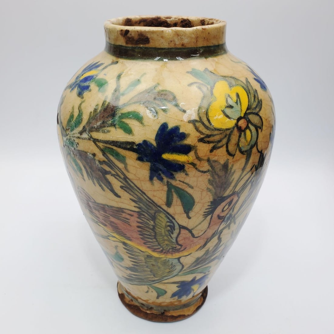 Antique Persian Qajar Dynasty Ceramic Vase: Antique Persian Qajar Dynasty Ceramic Vase Depicting Birds & Flowers. Condition: Generally Good. Dimensions: Larger H- 9.8" x Dia- 6.6". Provenance: From a Long Island, NY Home. Please note the absenc