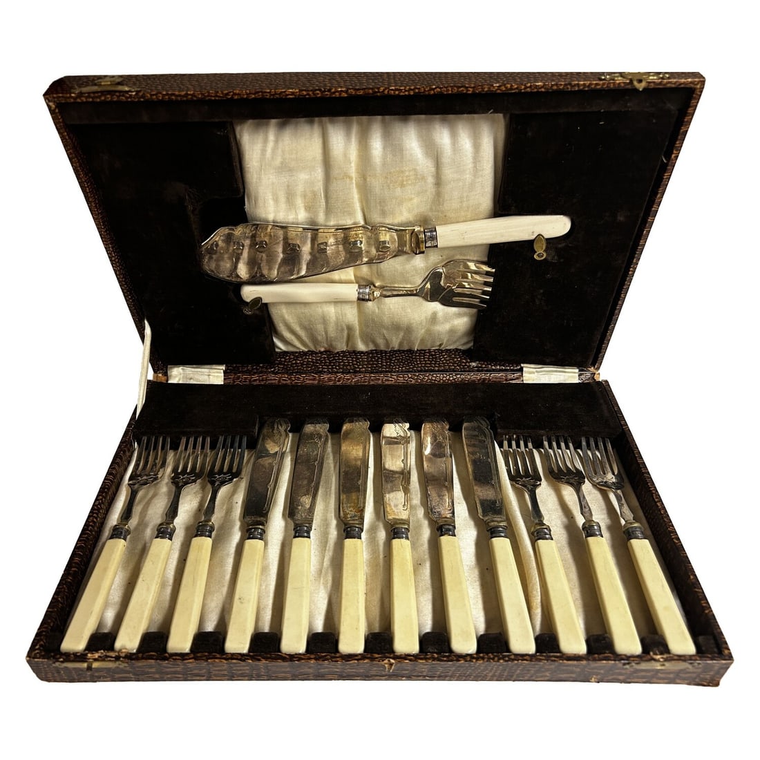 Vintage EPNSA Fish Cutlery Set: Vintage EPNSA (Electroplated Nickel Silver Alloy) Fish Cutlery Set Including 6 Knives, 6 Forks, and 2 Serving Utensils in a Fitted Wooden Box. Condition: Sold As Is. Box Needs Attention. Dimensions: B