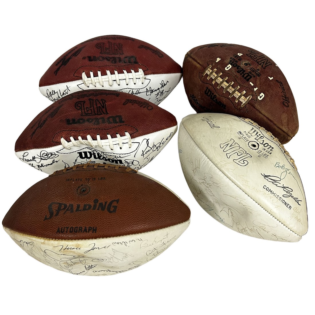 Lot of 4 Signed Footballs Along w/ 1 Unsigned: Lot of 4 Signed Footballs Along w/ 1 Unsigned. Condition: Generally Good w/ Wear & Tear. Sold As Is. Dimensions: Each Football L-11.25". Provenance: From a Long Island, NY Home. Please note the absenc